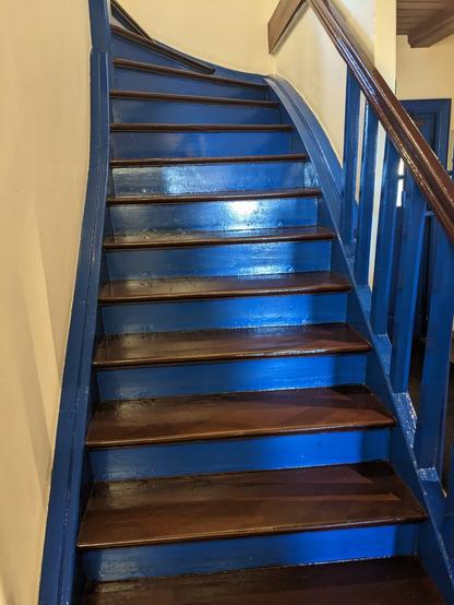 The colour scheme carries through to the inside, such as this staircase.