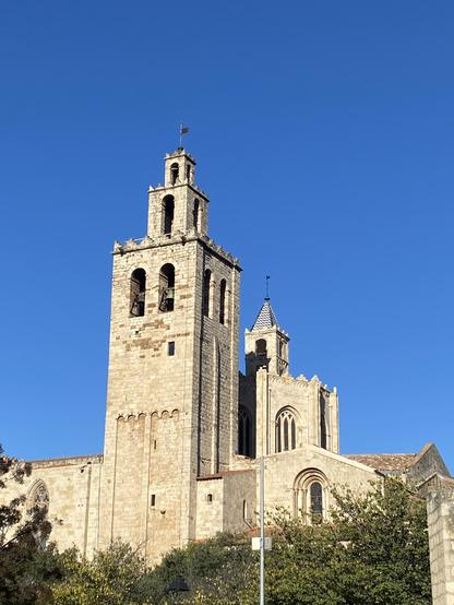 View of monestir del Sant Cugat with blue sky behind