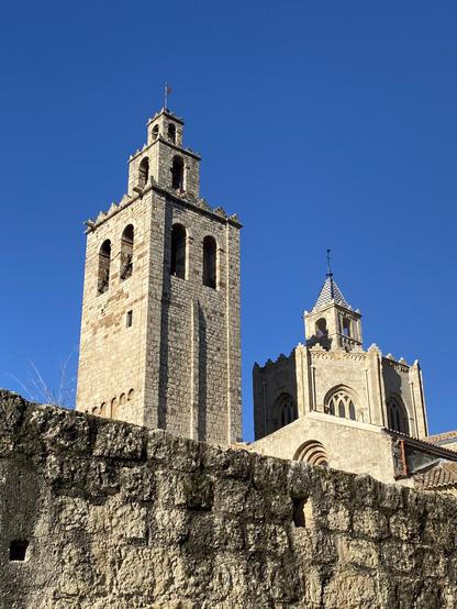 View of monestir del Sant Cugat with blue sky behind