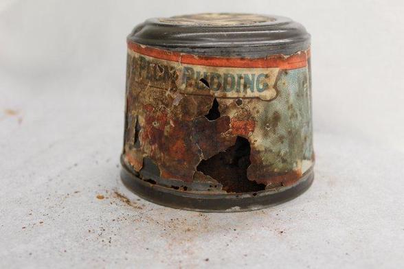 This fragile Christmas pudding is believed to be the last surviving from a batch of 1,000 sent to naval personnel during the Boer War at Christmas in 1900
