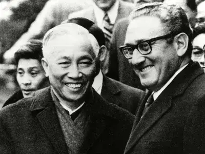 Henry Kissinger (right) shaking hands with Le Duc Tho in Paris after their agreement on the cease-fire terms of the Vietnam War, 1973.