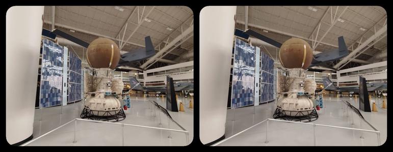 Evergreen Air & Space Museum, McMinnville, Oregon. Russian satellite. Kind of like a barbell standing on one end with blue solar-panel wings.

3D, parallel views.