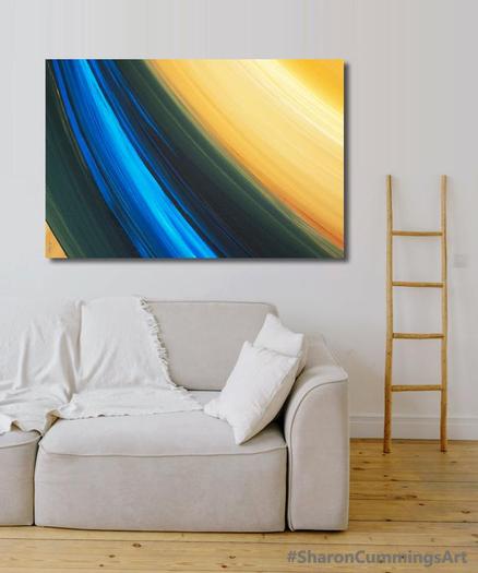Blue and gold painting in a furniture setting by artist Sharon Cummings.