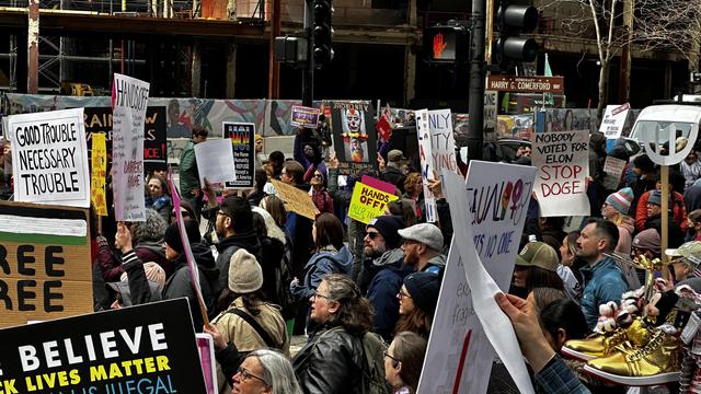 #Chicago #HandsOff #Protests 

#TheTroubles from #Ireland are here in the #US. Sign says "#GoodTrouble #NecessaryTrouble" 

On the bottom right is someone demonstrates with #Trump #GoldenSneakers