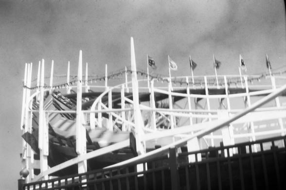 More or less the same, but the train is blurred with movement.