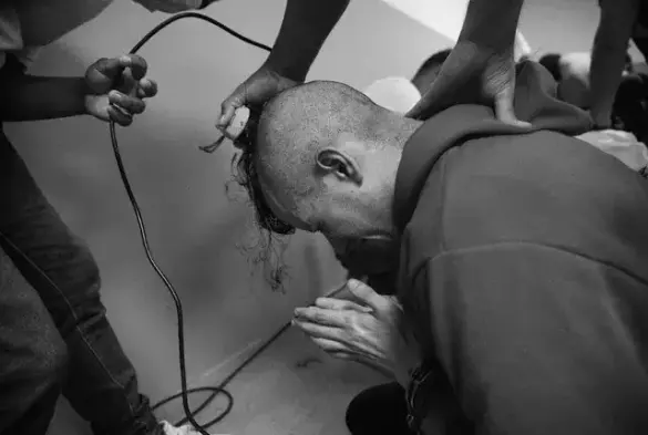 This is a black and white photo of gay make up artist Andry Romero, who is an innocent man deported from the USA to a concentration acmp in El Salvador