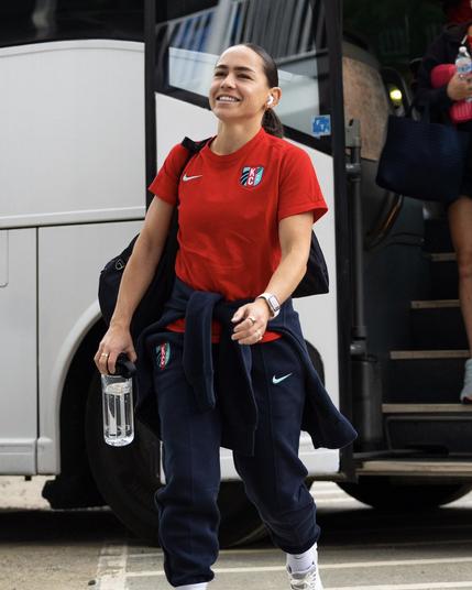 LaBonta smiling as she arrives at the stadium