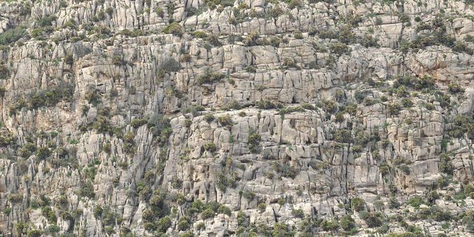 A photo of a rocky cliff side.