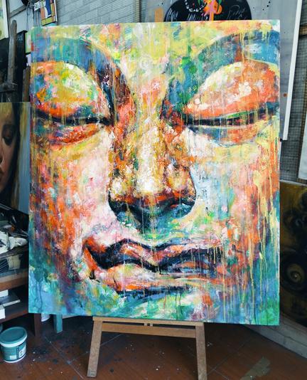 a painting of a face, close-up, the eyes low in meditation, done with a light palette, lots of greens and yellows and blues and light oranges and yellows , lots of splatter and drip effects