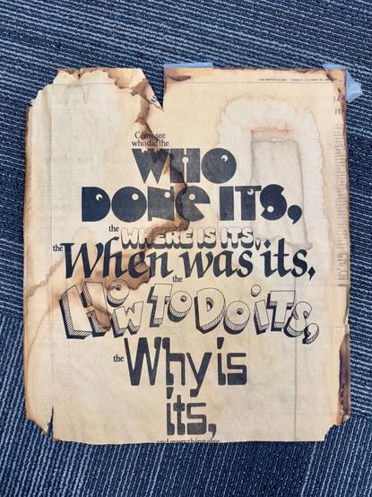 A news paper page from the Boston globe that was taped to the front of the KL-udge