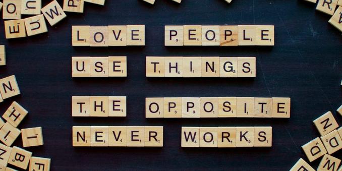 Scrabble tiles that say 'Love people, use things - the opposite rarely works.'