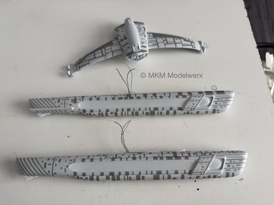 Model parts with grey vinyl masks applied