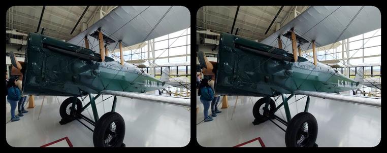 Biplane. Green body -- it's a mail plane.