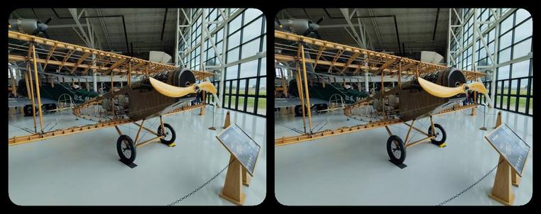 Biplane, no cloth on wings to show wooden structure.