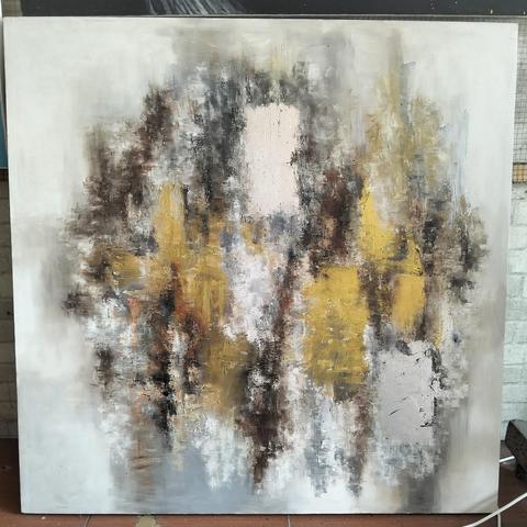 a painting, in the center against a silver white cloudy backing are black, gold, and rust tones emerging