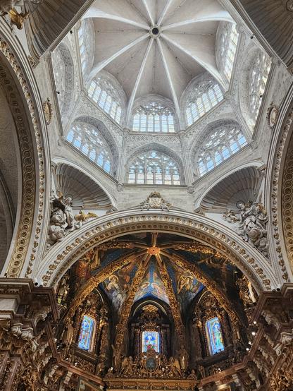View up into the loggia of the cathedral apse, showing the top of the apse (see pic in post above) at bottom. The loggia is white inside with vaulted ceilings and two levels of clear glass windows.