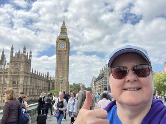 Cheesy thumbs up Tourist image needed for a Virtual Geocache at Big Ben. Selfie of me in front of the Houses of Parliament with Big Ben in the background
