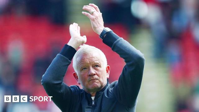 Sheffield United boss Chris Wilder applauding the fans post-match.