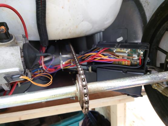 A picture of inside the back of the Sinclair C5, showing the control box installed without the top cover on with all the wires fully connected.