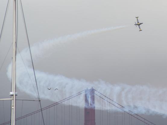 Ace Maker - T-33 doing a fly by and turn with the golden gate bridge in the background