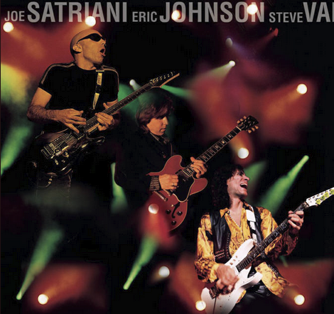 Cover art for album G3: Live in Concert. It shows Joe Satriani, Eric Johnson, and Steve Vai playing electric guitars in similar fashion. Green and red spotlights illuminate them through stage fog.