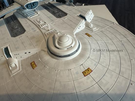 Top of the saucer section showing the painted phaser banks.