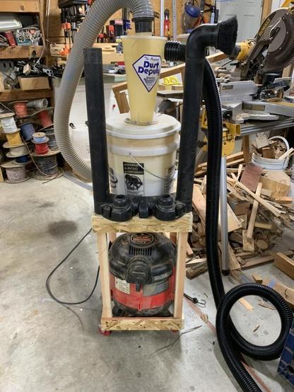 original backpack fixed to the top of the cart with the wands attached