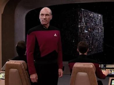 Picard with Borg cube in view screen