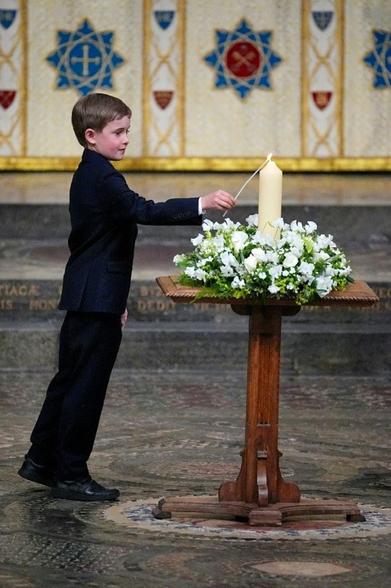 The great-great-grandson of war-time leader Winston Churchill, 10-year-old Alexander Churchill, lights the VE Day 80th Candle of Peace at Westminster Abbey (Aaron Chown)