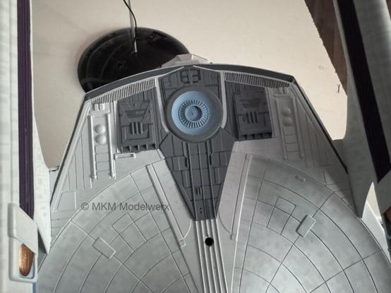 Dark grey paint applied to the back edge of the model.