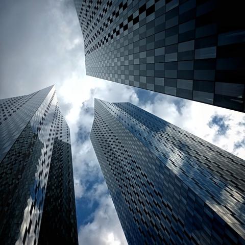 glass building shot in very deep counter perspective, very blue colour palette