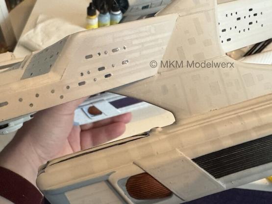Closeup of some windows with the white glue on them. Some have went clear.