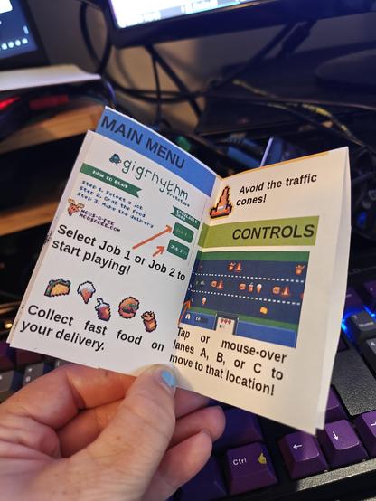 Photo of the minizine manual for the game with the instructions (also readable on the itchio page).