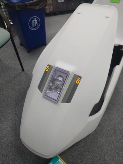 A picture of the Sinclair C5 body showing the front scrubbed of all dirt marks.