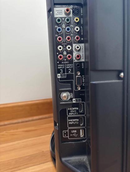 A photo of the rear input panel for the TV mentioned in the previous post. It has two rows of composite jacks, a row of AV jacks, an S-video jack, an RGB PC jack, a standard coax antenna jack, two HDMI jacks, and a USB port.