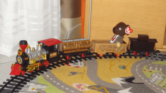 Toy train transporting a Teddy (Mr Bean Merchandise)