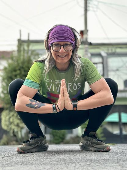 Me in full running gear, squatting before the camera for the traditional post-workout selfie.