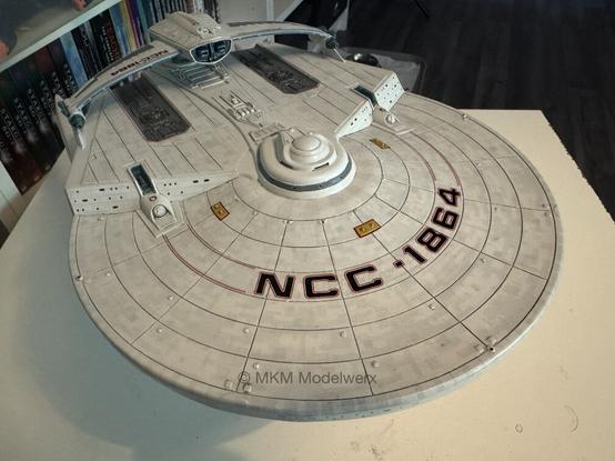 Top of the saucer section with all but the name decal in place.