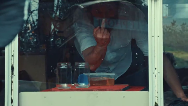 Taskmaster s19 - Jason Mantzoukas flipping off the camera through the window from inside the Submaravan.
