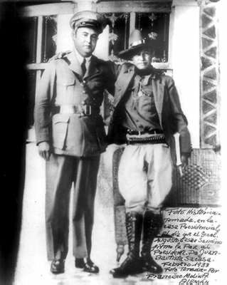 Sandino posing with future dictator of Nicaragua (and his future assassin), Somoza.
