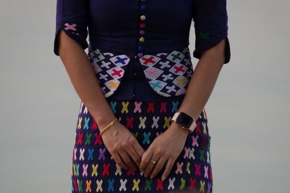 Detail of women's clothing with woven patterns