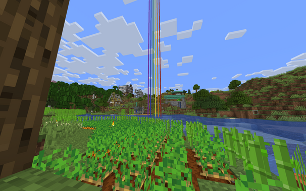 Beacon beams with all 6 colors of the rainbow flag.

In the foreground there is a field of potatoes and in the background there are large buildings one of my friends made.