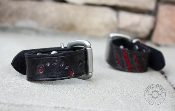 A shot of the cuffs, showing the bite- and claw-mark tooling