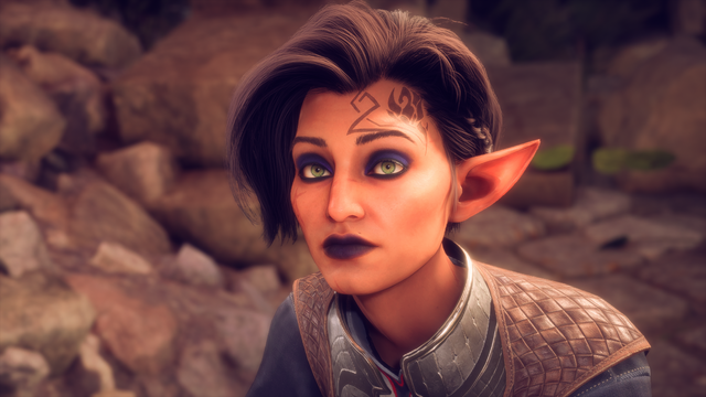 Screenshot of my OC, Alana de Riva. They're a nonbinary elf assassin with short dark hair, heavy purple eyeshadow and lipstick, and a small tattoo on their forehead.