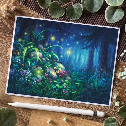 A photo of a print in landscape format placed on a wooden table and surrounded by an apple pencil 1st gen, dried flowers, and leaves for decoration.
The print features a forest flooded in bluish light, a rocky overgrown mound in the foreground on the left. Vibrant flowers in blue, yellow, and red grow on it, and yellowish lights resembling fireflies hover around it.