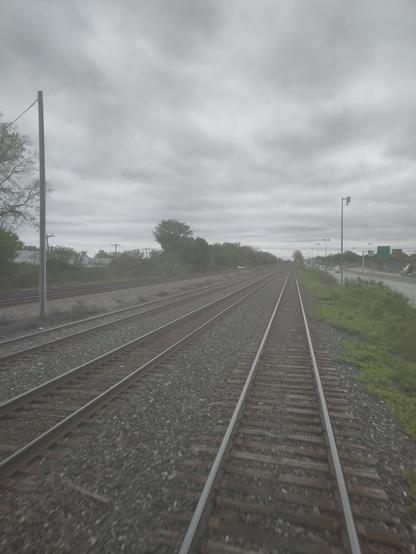 Foto Eisenbahngleise in einer Geraden.