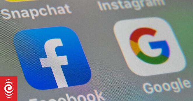 A picture taken on October 1, 2019 in Lille shows the logos of mobile apps Facebook and Google displayed on a tablet. (Photo by DENIS CHARLET / AFP)