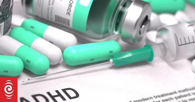 ADHD - Printed Diagnosis with Blurred Text. On Background of Medicaments Composition - Mint Green Pills, Injections and Syringe.