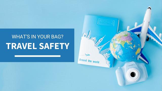 A flatlay photo with a light blue background. On the right of the flatlay there is a passport cover that has "Around the World" written on it and drawings of the Eiffel Tower, Big Ben, Sistine Chapel, Tower of Pisa, and other global landmarks. There's a small globe, a model plane and Polaroid camera. There's a textbox that reads: What's in your bag? Travel Safety.