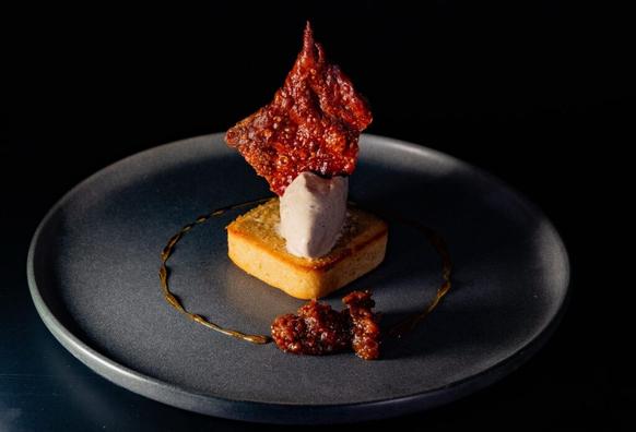 Foie gras ice cream, burnt honey gastrique, smoked fig compote, crispy chicken skin, financier